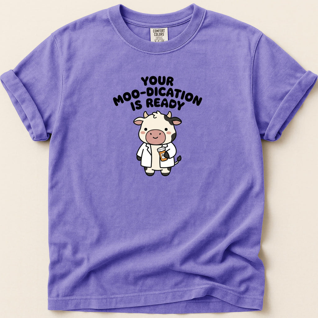 Purple t-shirt with cartoon cow and text "Your Moo-dication Is Ready".