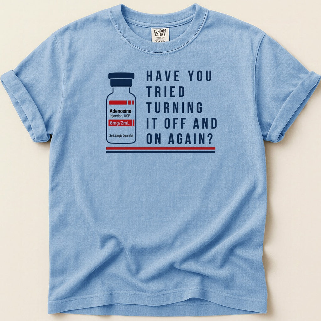 Blue t-shirt with vial graphic and text "Have you tried turning it off and on again?"