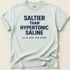 T-shirt with "SALTIER THAN HYPERTONIC SALINE 3% IS JUST THE START" text.