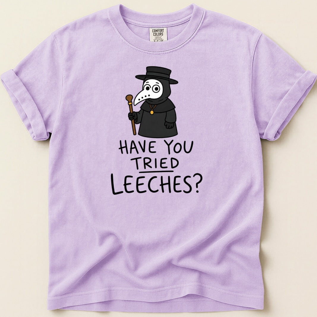 T-shirt with a plague doctor illustration and text "HAVE YOU TRIED LEECHES?".