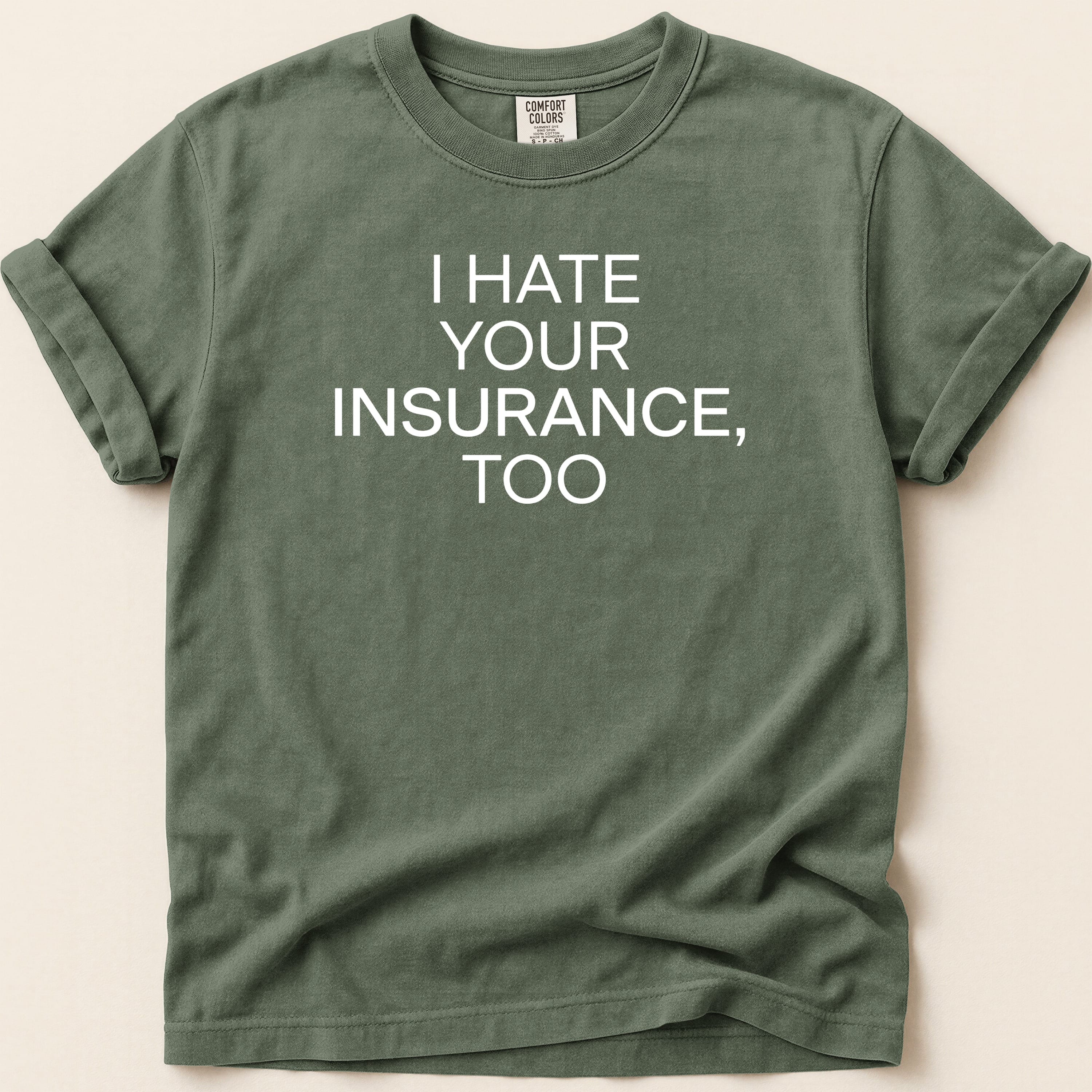Green t-shirt with white text "I HATE YOUR INSURANCE, TOO".