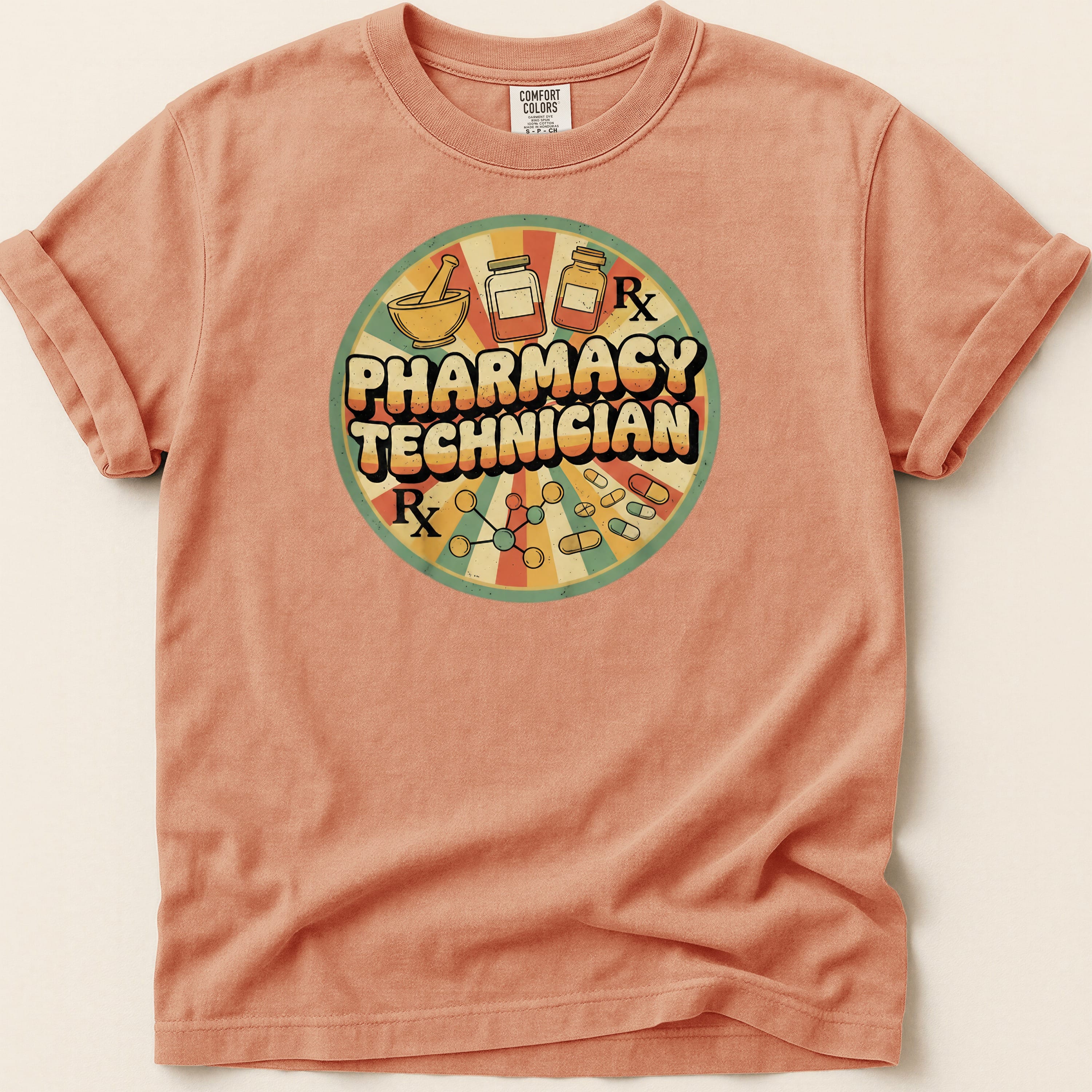 Orange t-shirt with "Pharmacy Technician" text and medical graphic.