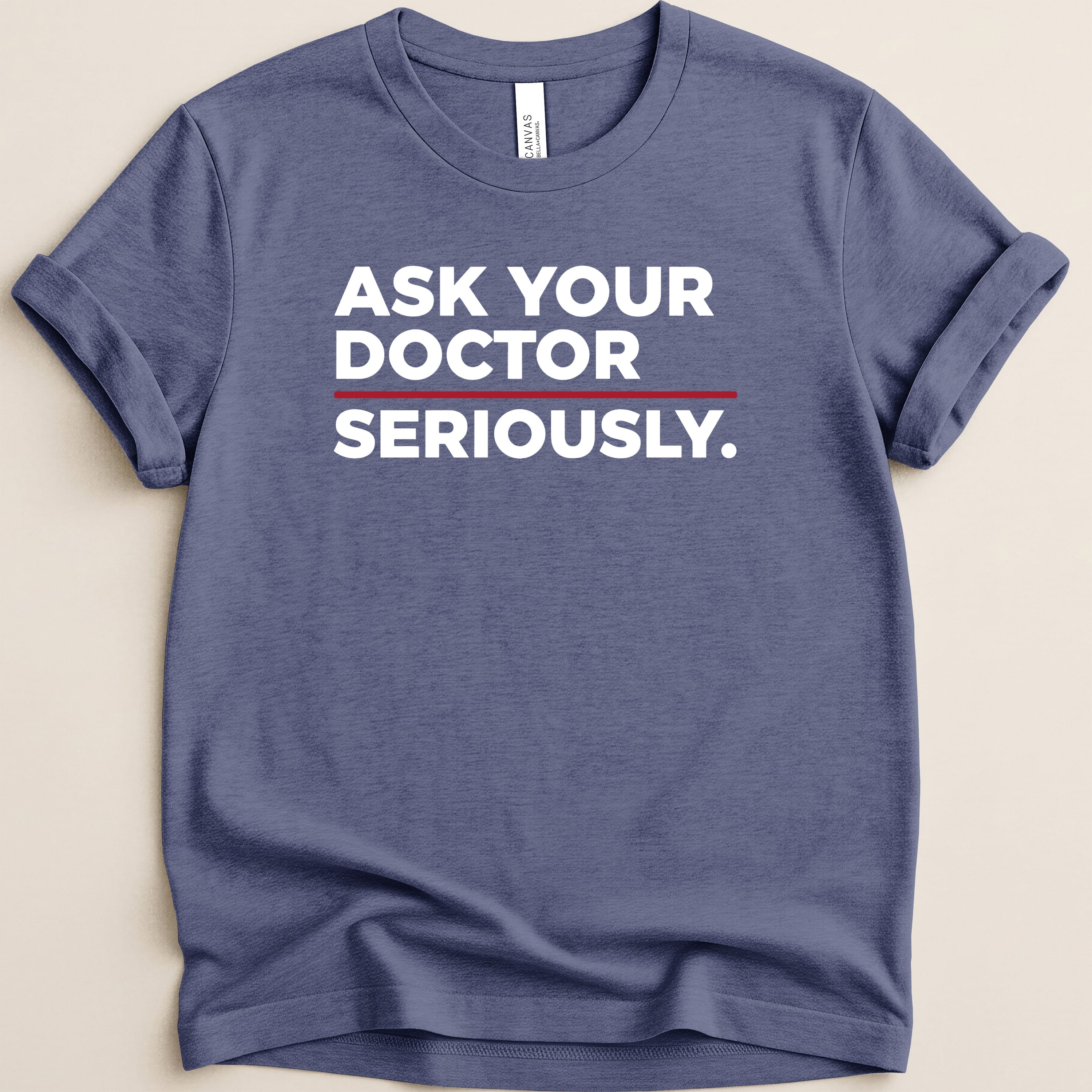 Blue t-shirt with "ASK YOUR DOCTOR SERIOUSLY." text.