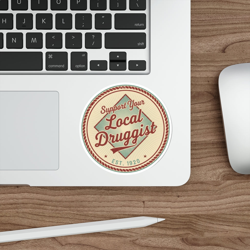 Circular sticker with "Support Your Local Druggist EST. 1920" text.