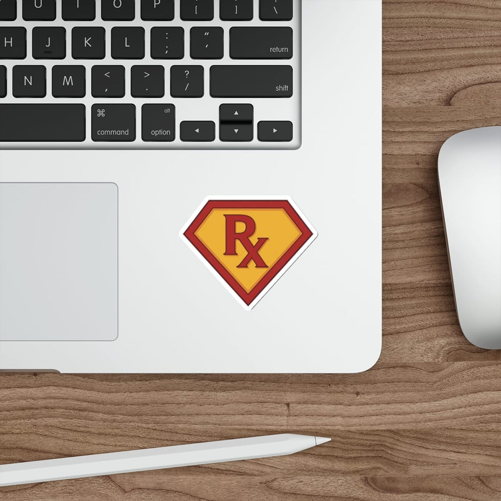 Red and yellow shield with "RX" inside, on a laptop keyboard.