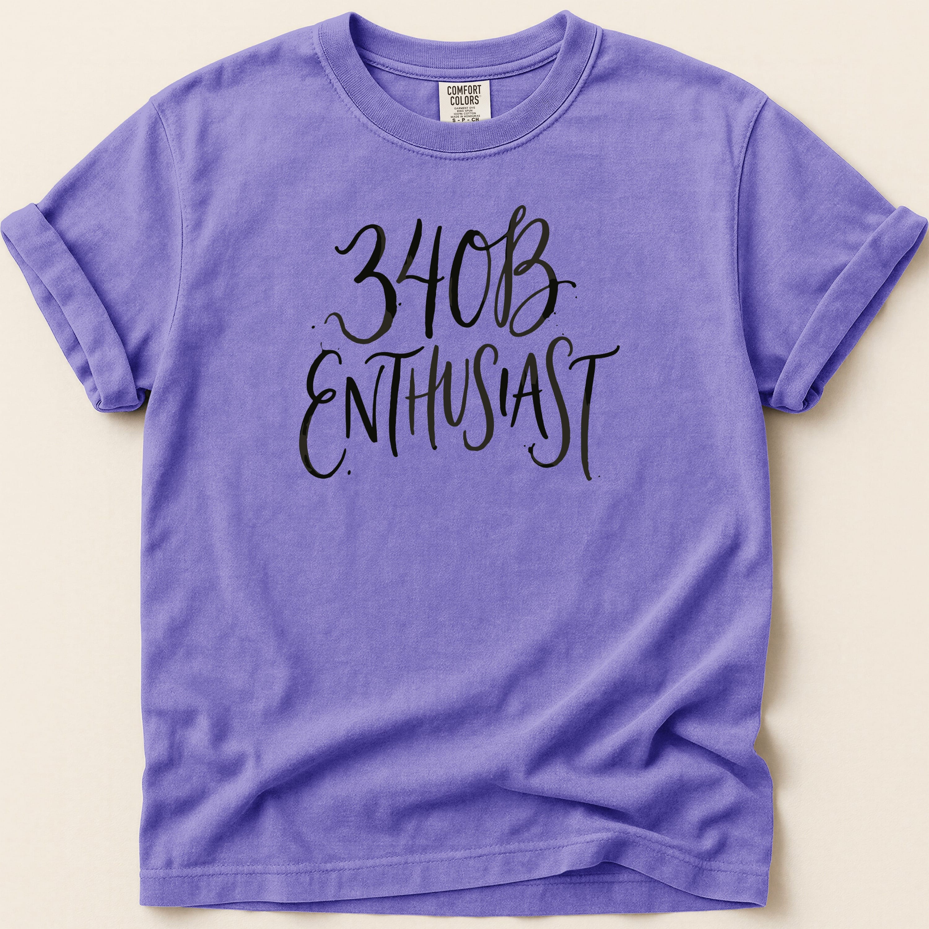 Purple t-shirt with "340B ENTHUSIAST" in black script text.