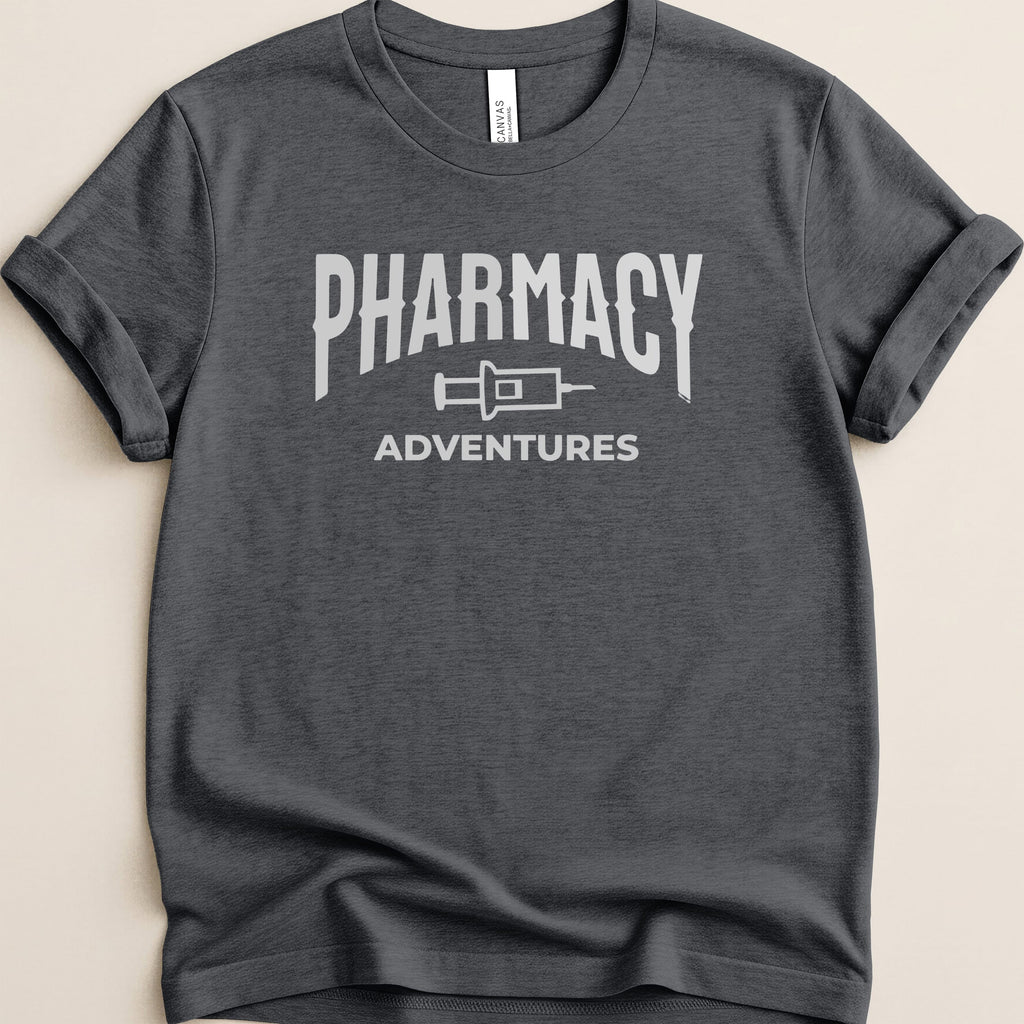 Charcoal t-shirt with "PHARMACY ADVENTURES" and syringe graphic.