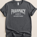 Charcoal t-shirt with "PHARMACY ADVENTURES" and syringe graphic.