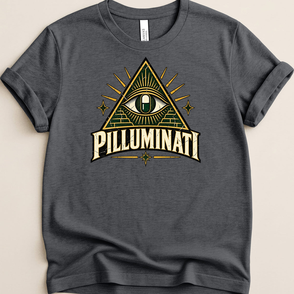 Dark grey t-shirt with a triangular graphic featuring an eye and the text "PILLUMINATI".