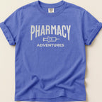 Blue t-shirt with "Pharmacy Adventures" text and syringe graphic.