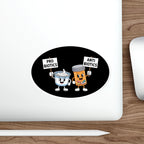 Cartoon probiotics and antibiotics characters holding signs.