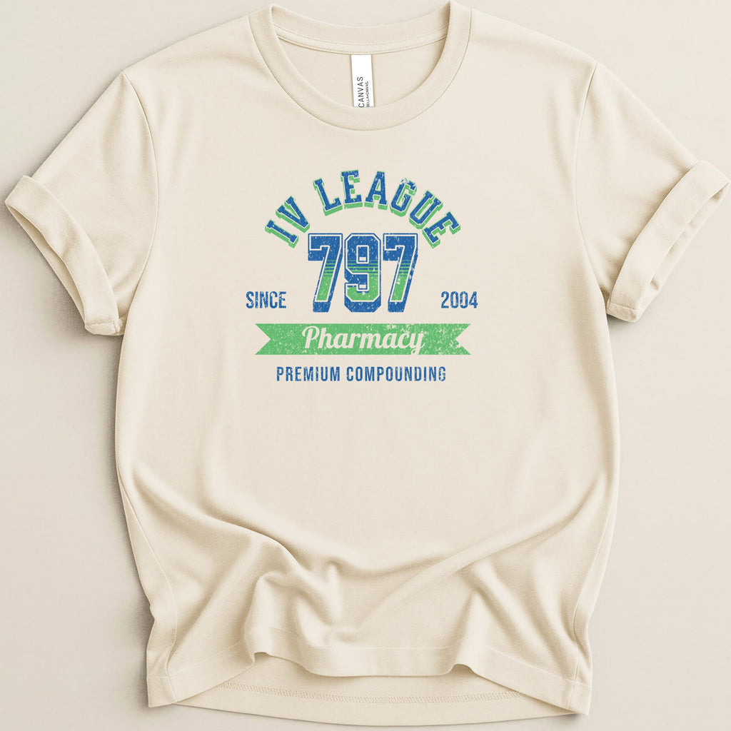 Cream t-shirt with "IV League 797 Pharmacy" and "Premium Compounding" text.