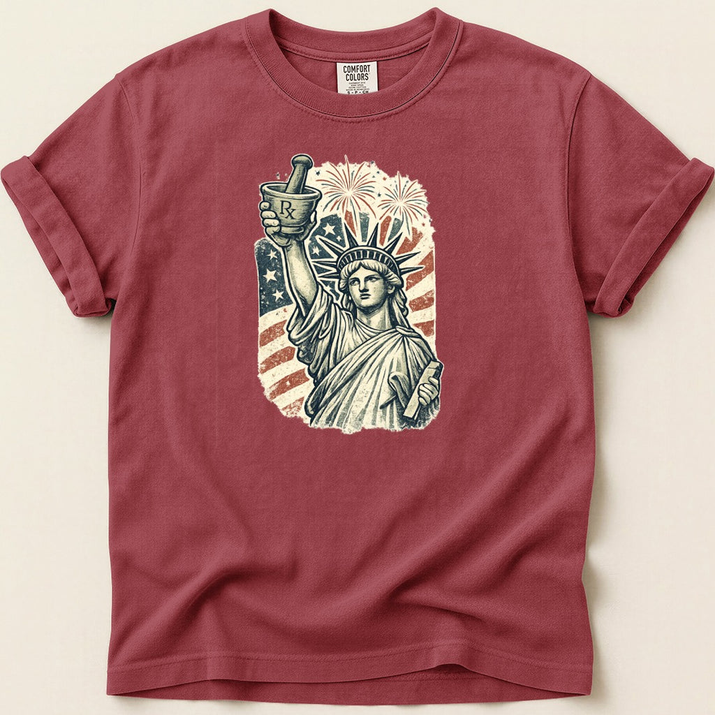 Statue of Liberty holding a mortar and pestle with fireworks and US flag background.