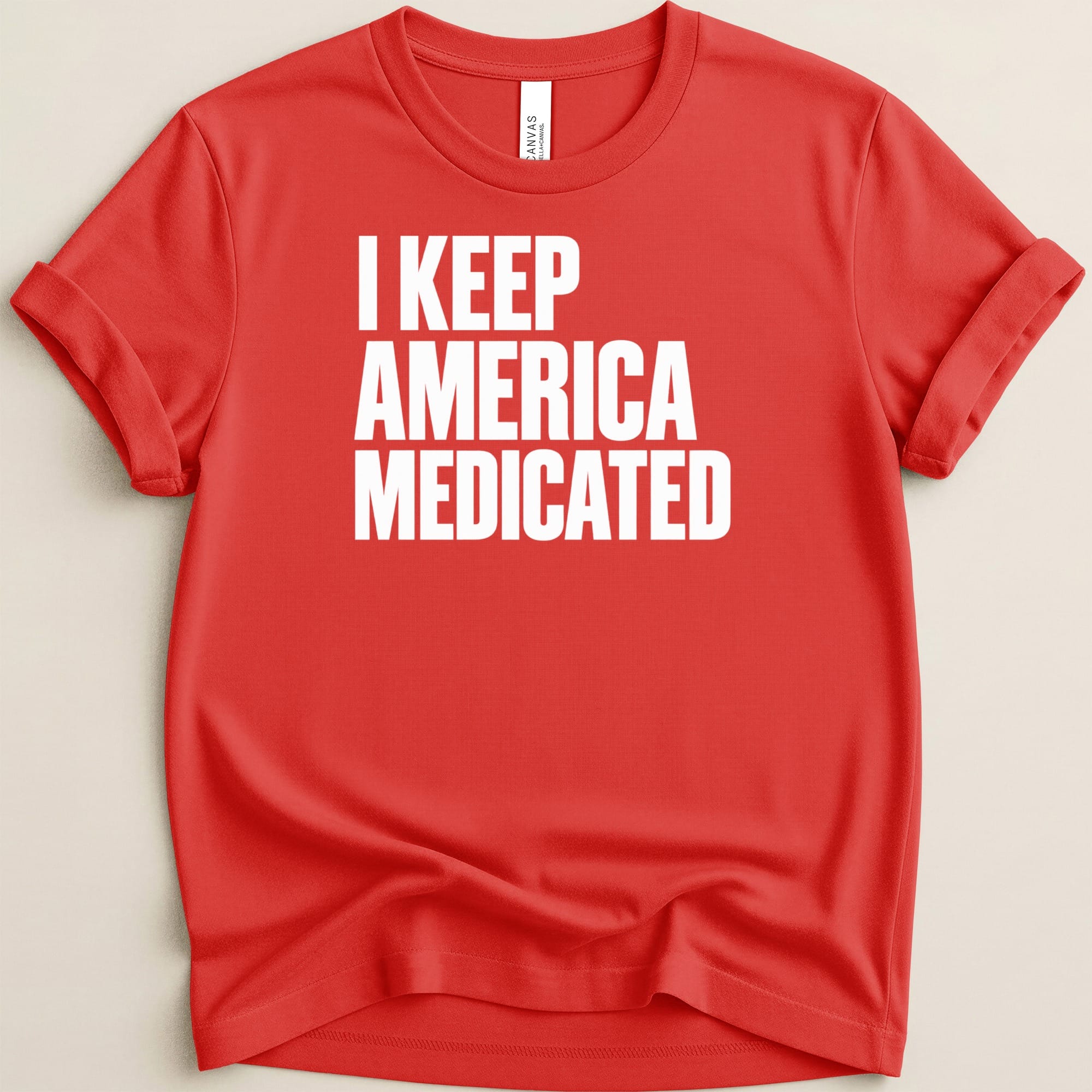 Red t-shirt with white text reading "I KEEP AMERICA MEDICATED."