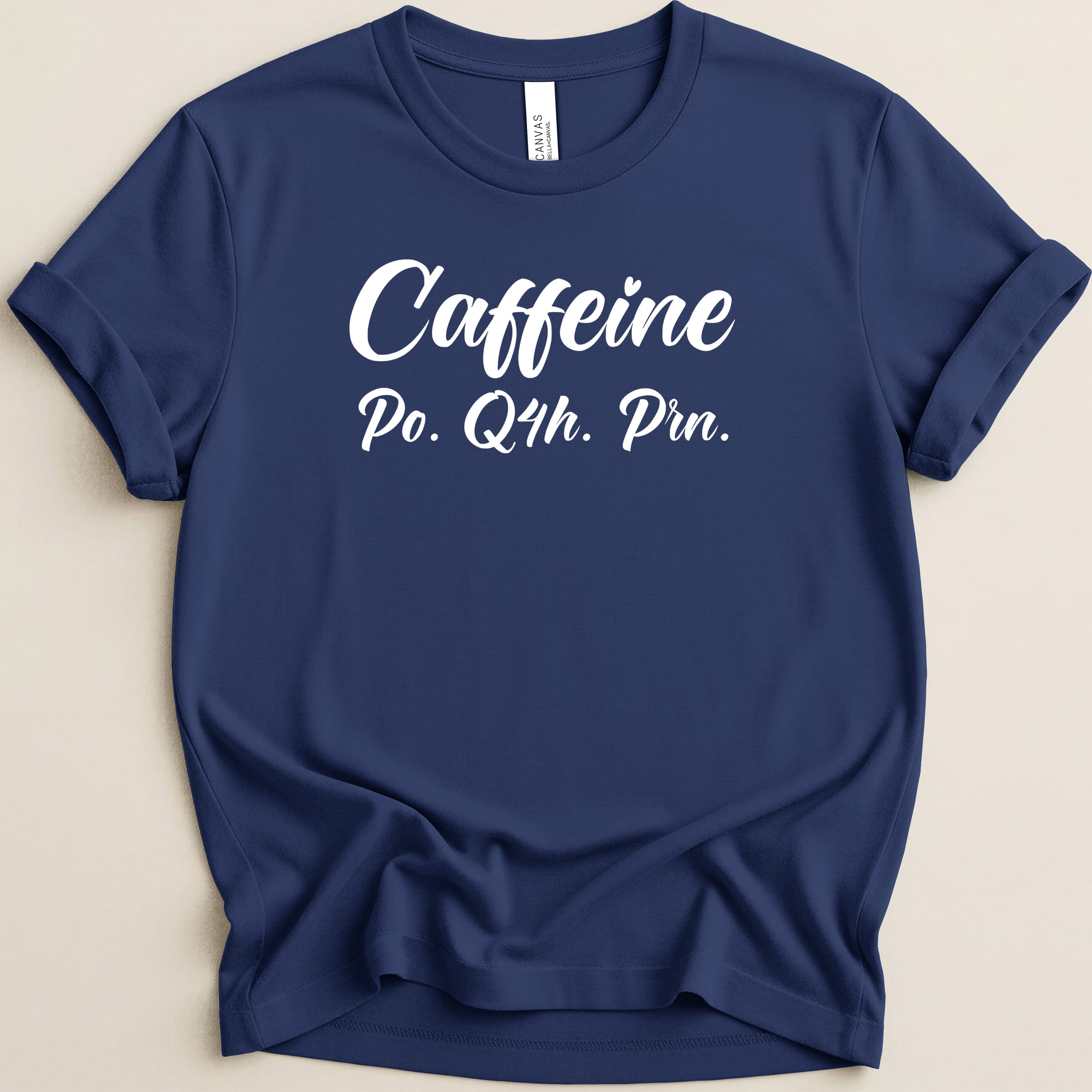 Navy t-shirt with white text "Caffeine Po. Q4h. Prn."