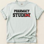 Light blue t-shirt with "PHARMACY STUDENT" text, the "ENT" crossed out.