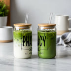 Two glass cups with straws, one with matcha and text.