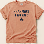 Orange t-shirt with "PHARMACY LEGEND" in navy distressed letters and a star.