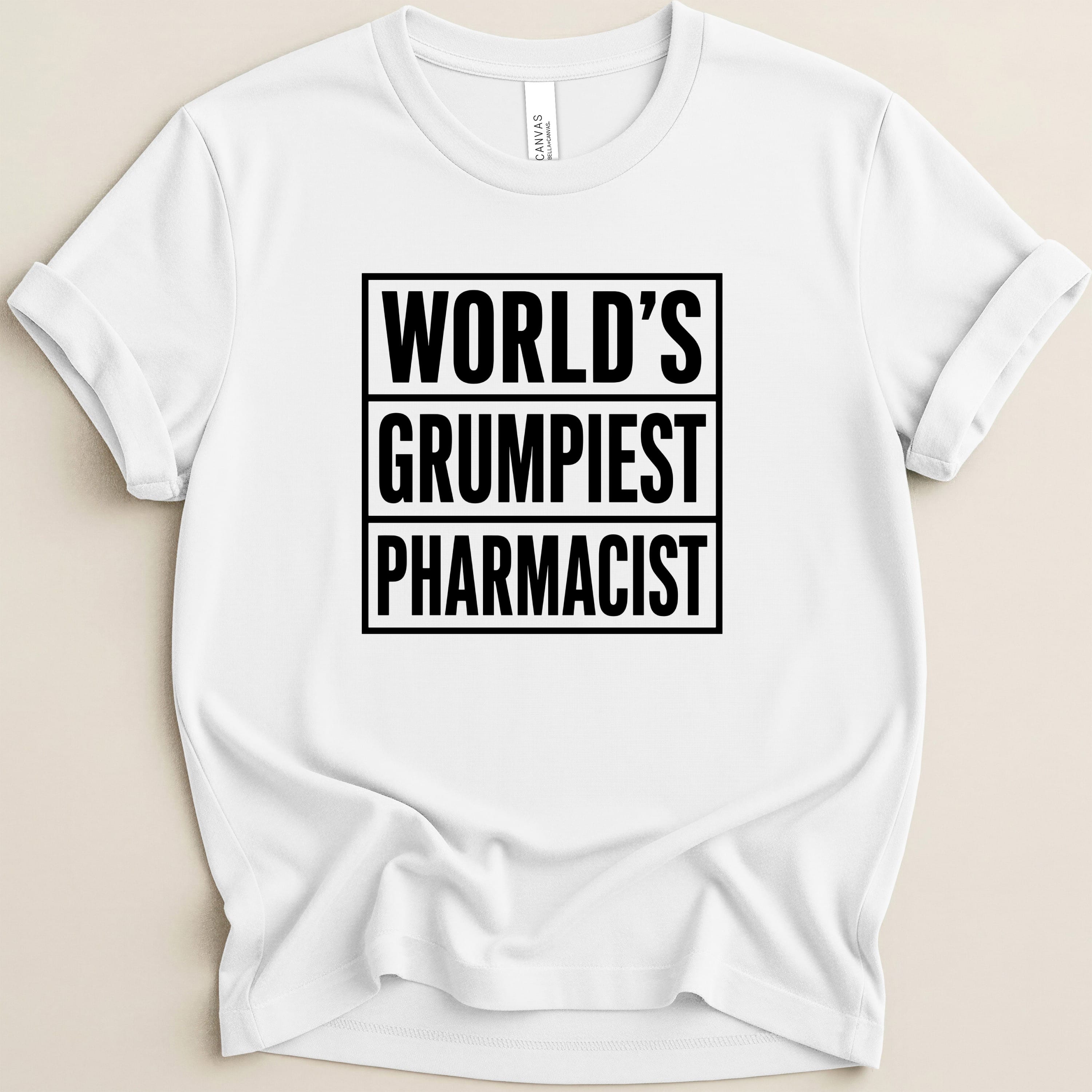 White t-shirt with "WORLD'S GRUMPIEST PHARMACIST" in bold black text.