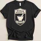 Black t-shirt featuring a shield logo for "William Procter Jr. Fan Club" with a mortar and pestle.