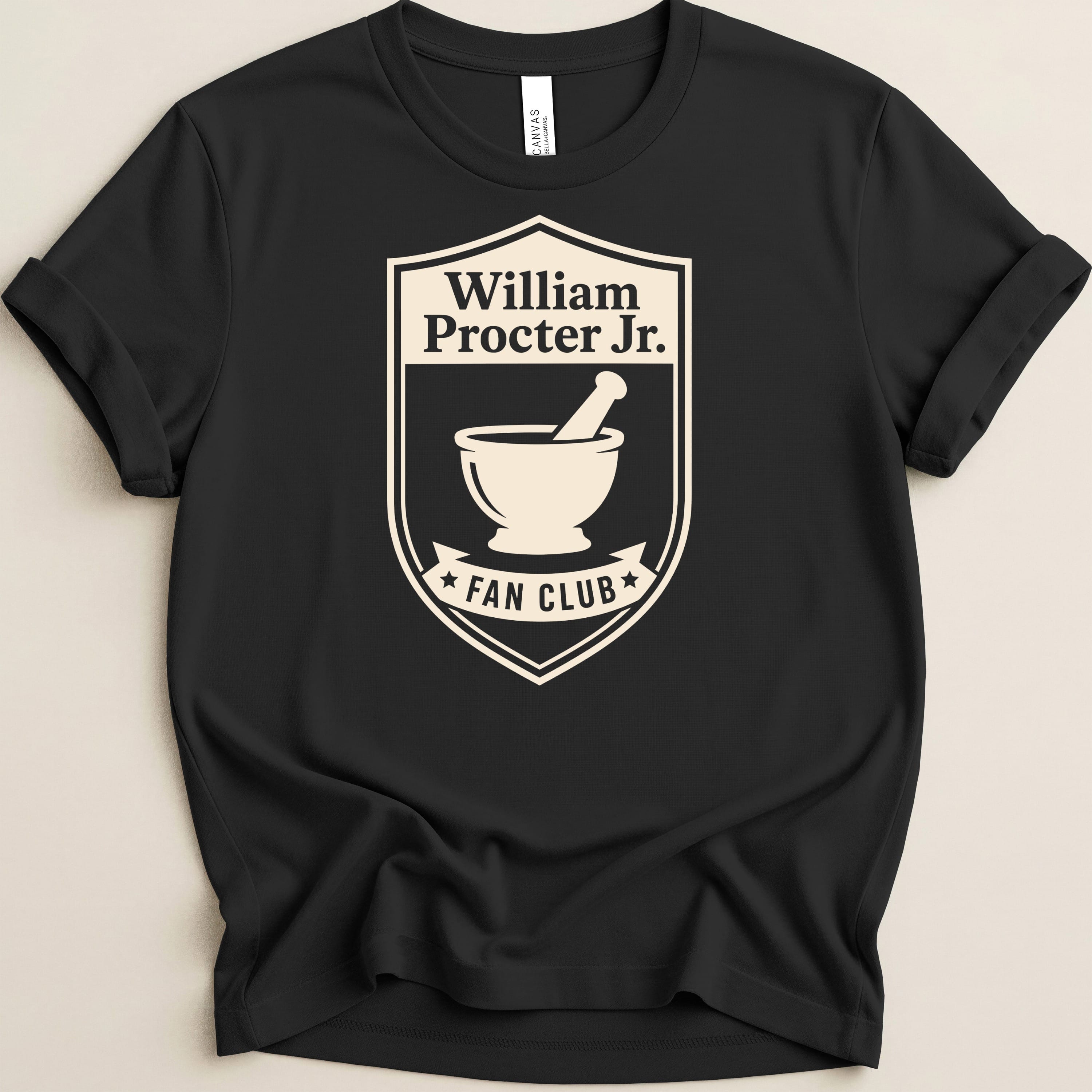 Black t-shirt featuring a shield logo for "William Procter Jr. Fan Club" with a mortar and pestle.