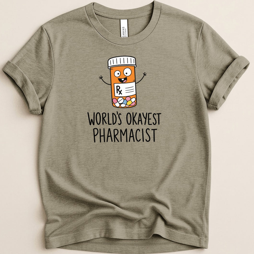 T-shirt with cartoon pill bottle and text "World's Okayest Pharmacist".