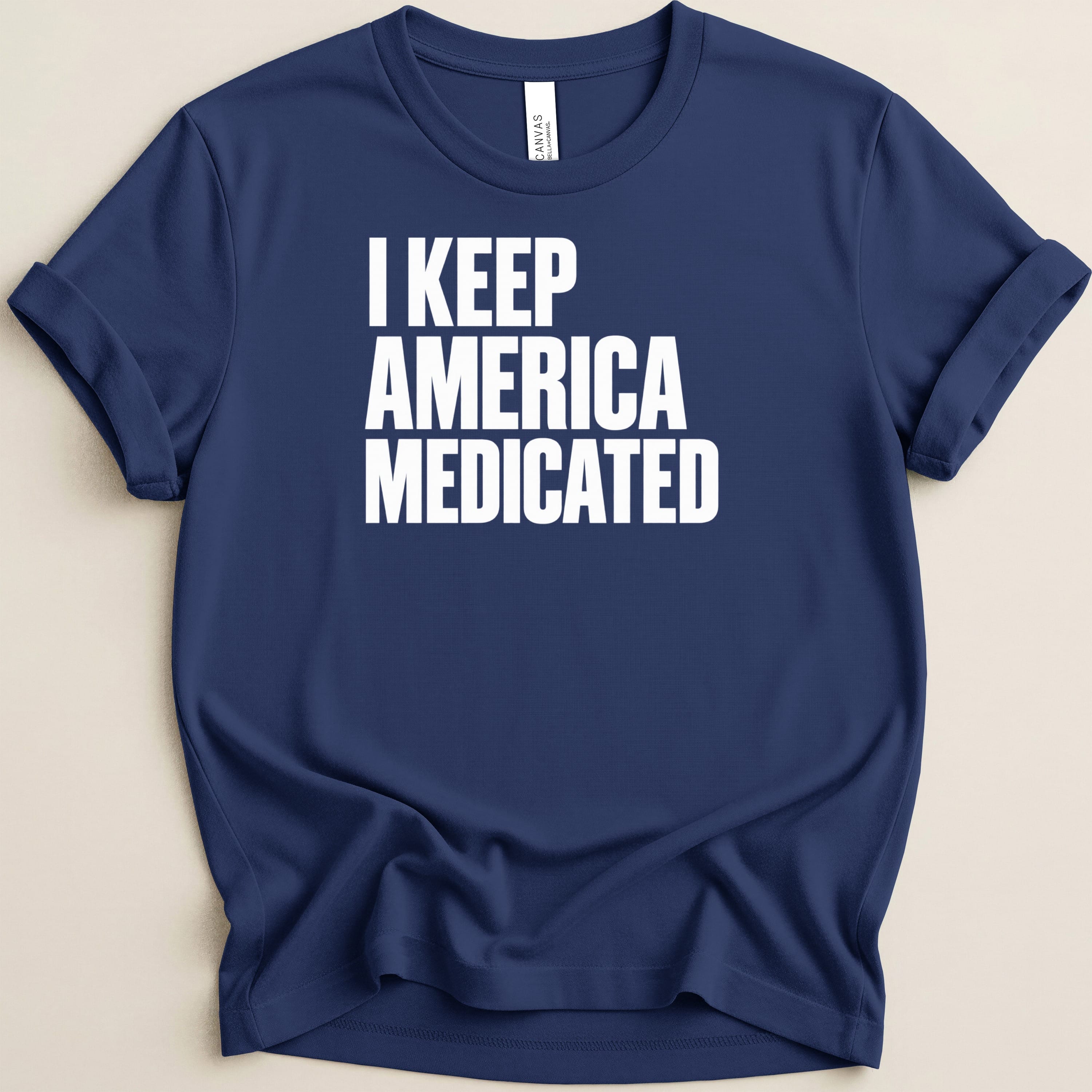 Navy t-shirt with white text "I KEEP AMERICA MEDICATED"