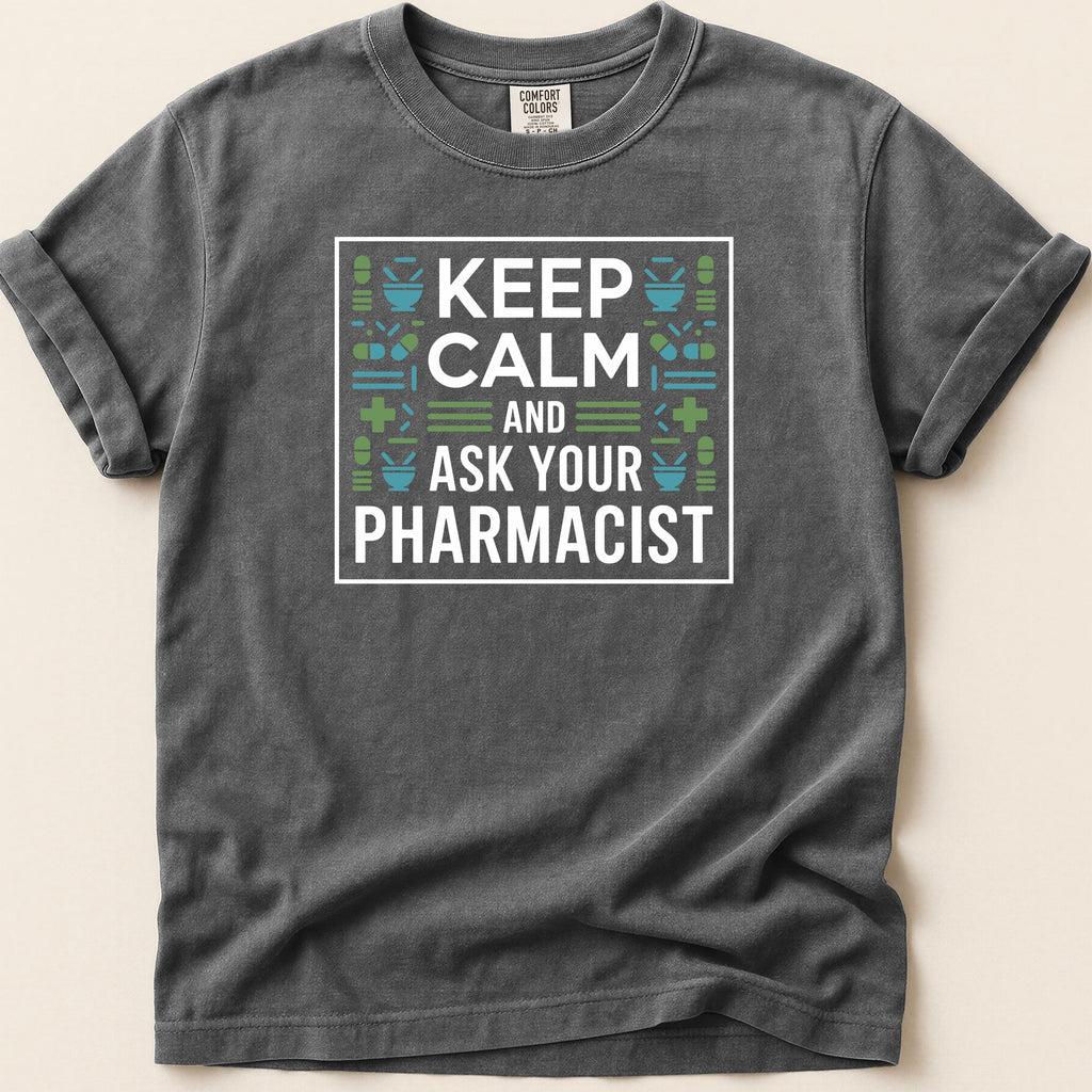 Dark grey t-shirt with "Keep Calm and Ask Your Pharmacist" text and medical icons.