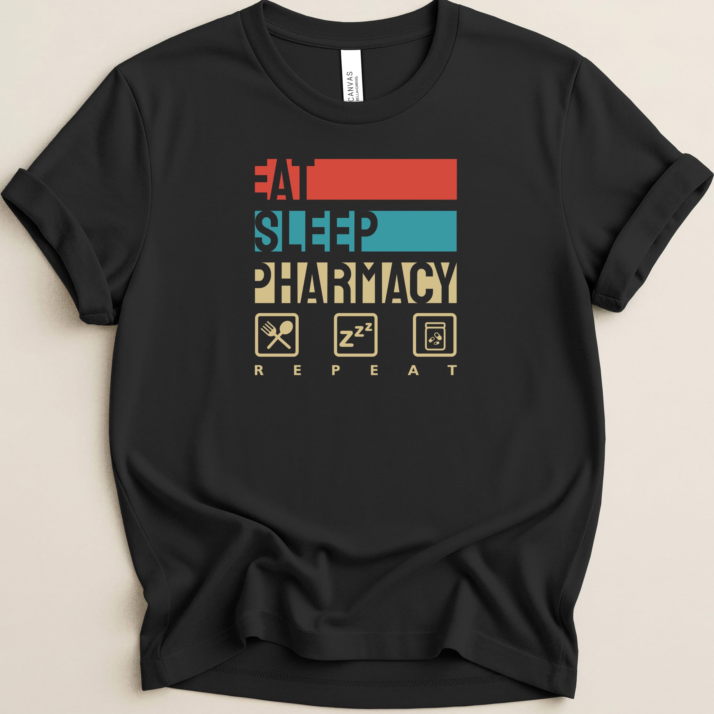Black t-shirt with "Eat Sleep Pharmacy Repeat" text and icons.