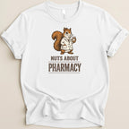White t-shirt with a squirrel in a lab coat holding a pill bottle and text.
