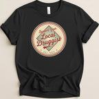 Black t-shirt with a circular graphic supporting local druggists.