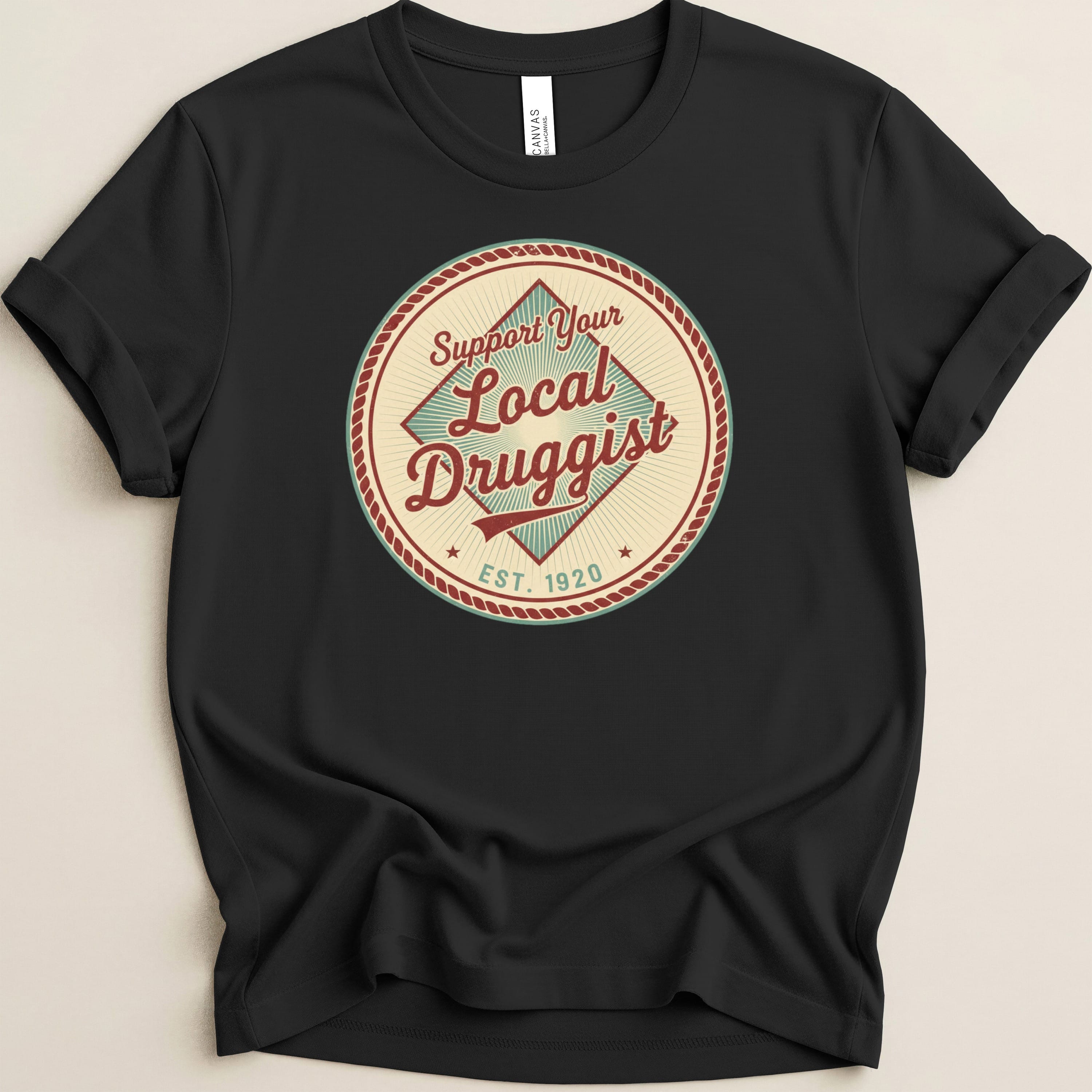 Black t-shirt with a circular graphic supporting local druggists.