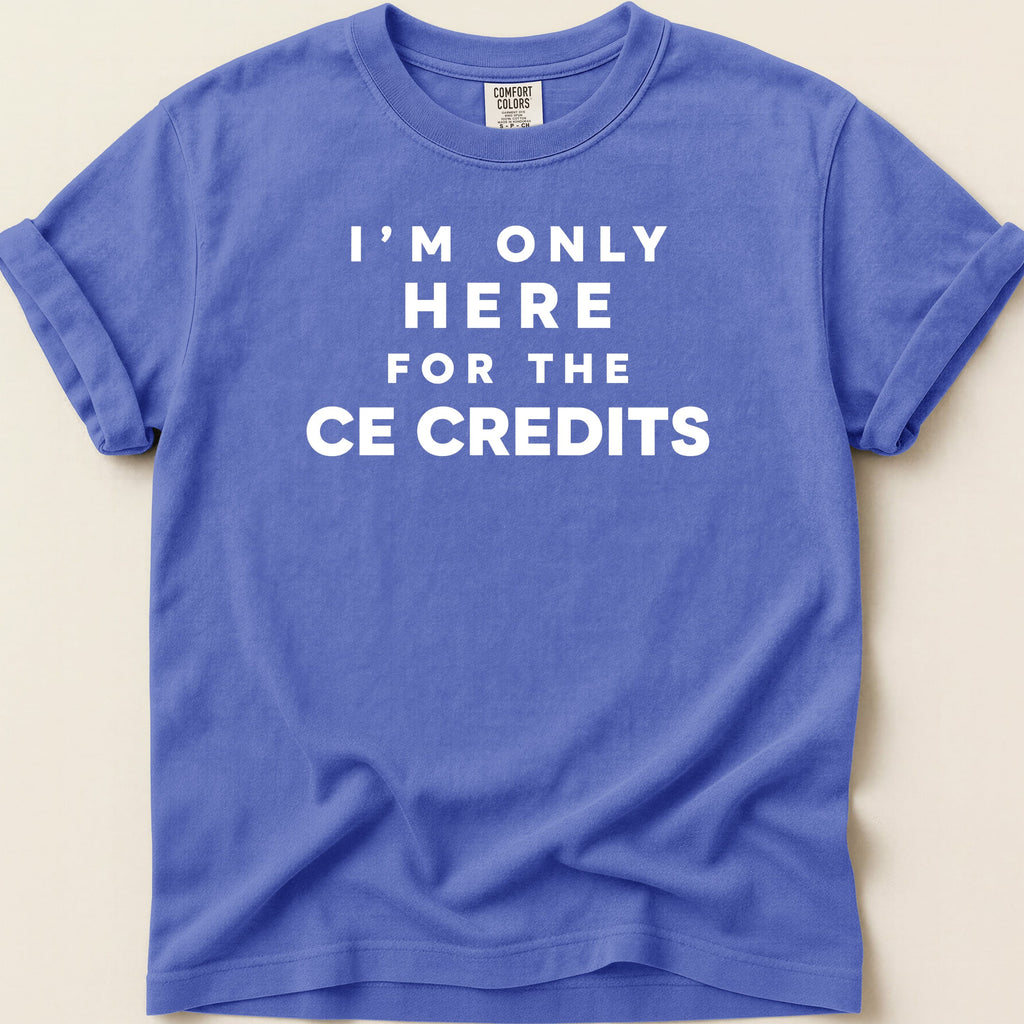 Blue t-shirt with "I'M ONLY HERE FOR THE CE CREDITS" in white text.