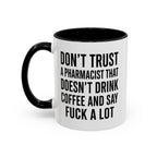 White mug with black rim and handle, "Don't trust a pharmacist that doesn't drink coffee and say fuck a lot."
