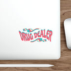 "Drug Dealer" text logo with wavy pink, blue, and white design on laptop.