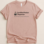 Pink t-shirt with "Certified Potion Dispenser" and humorous text.