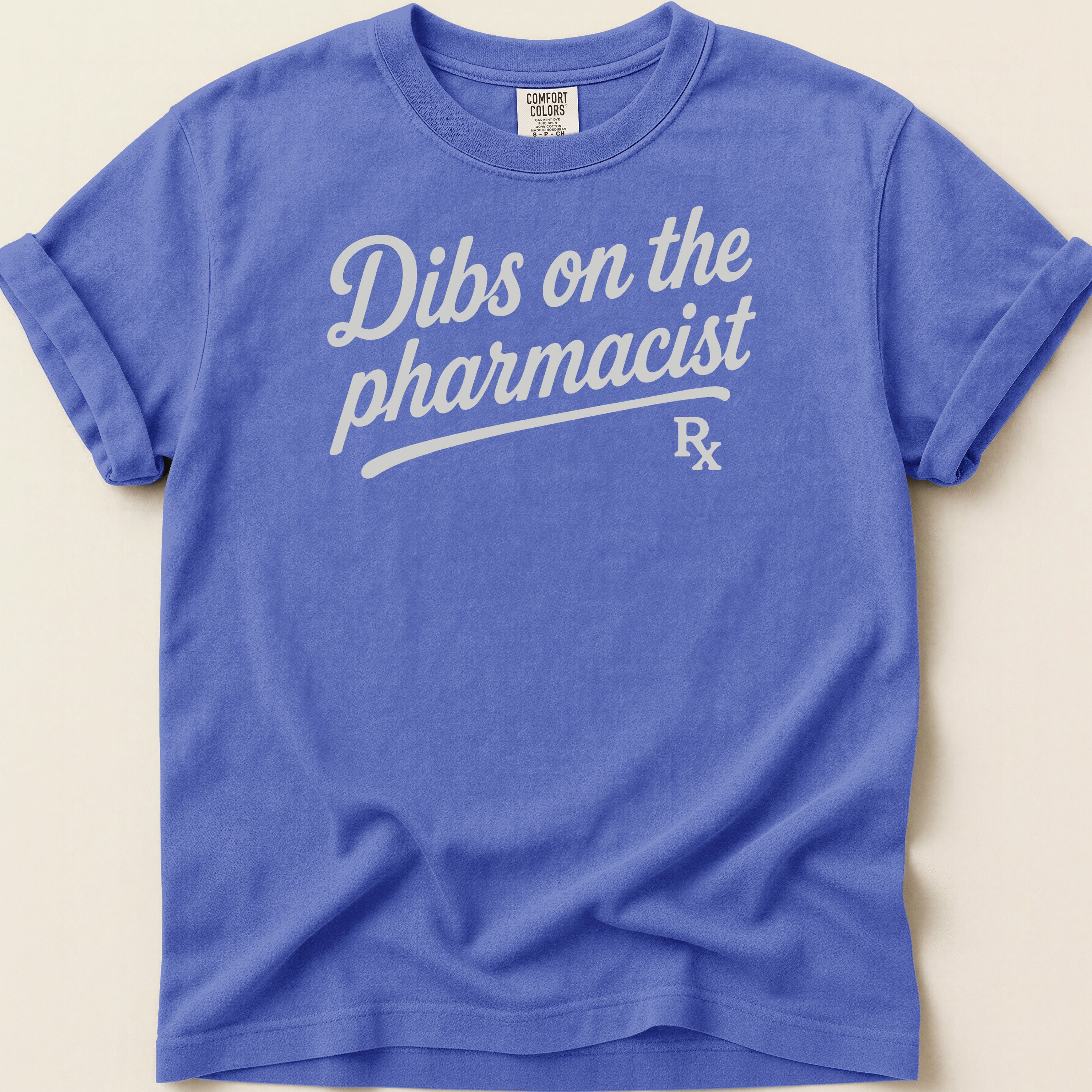 Royal blue t-shirt with "Dibs on the pharmacist Rx" text.