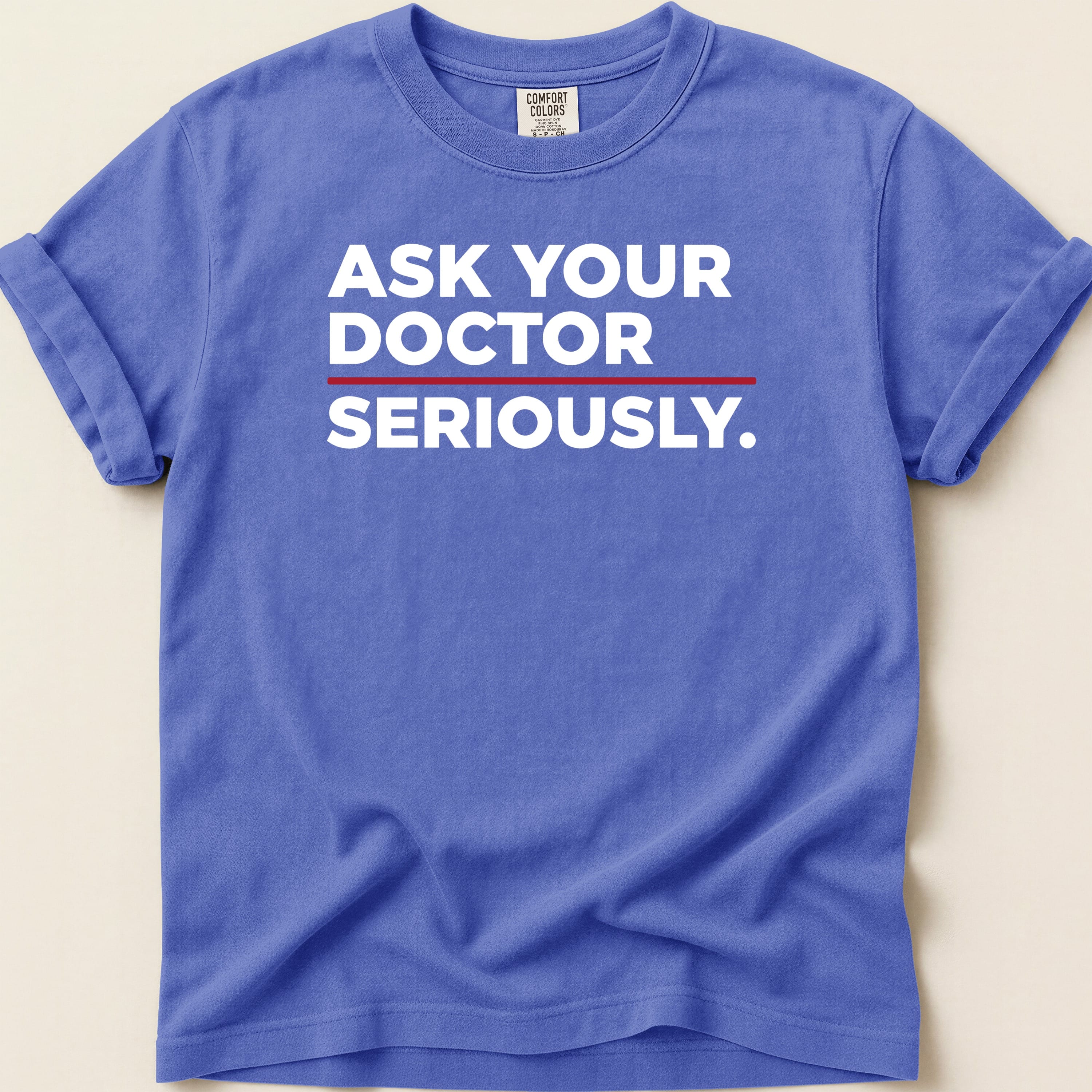 Blue t-shirt with "ASK YOUR DOCTOR SERIOUSLY." text.