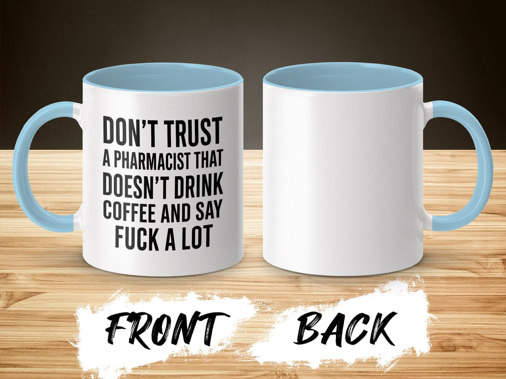 White mug with blue handle and interior, text reads "Don't trust a pharmacist that doesn't drink coffee and say fuck a lot."