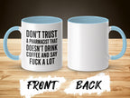 White mug with blue handle and interior, text reads "Don't trust a pharmacist that doesn't drink coffee and say fuck a lot."