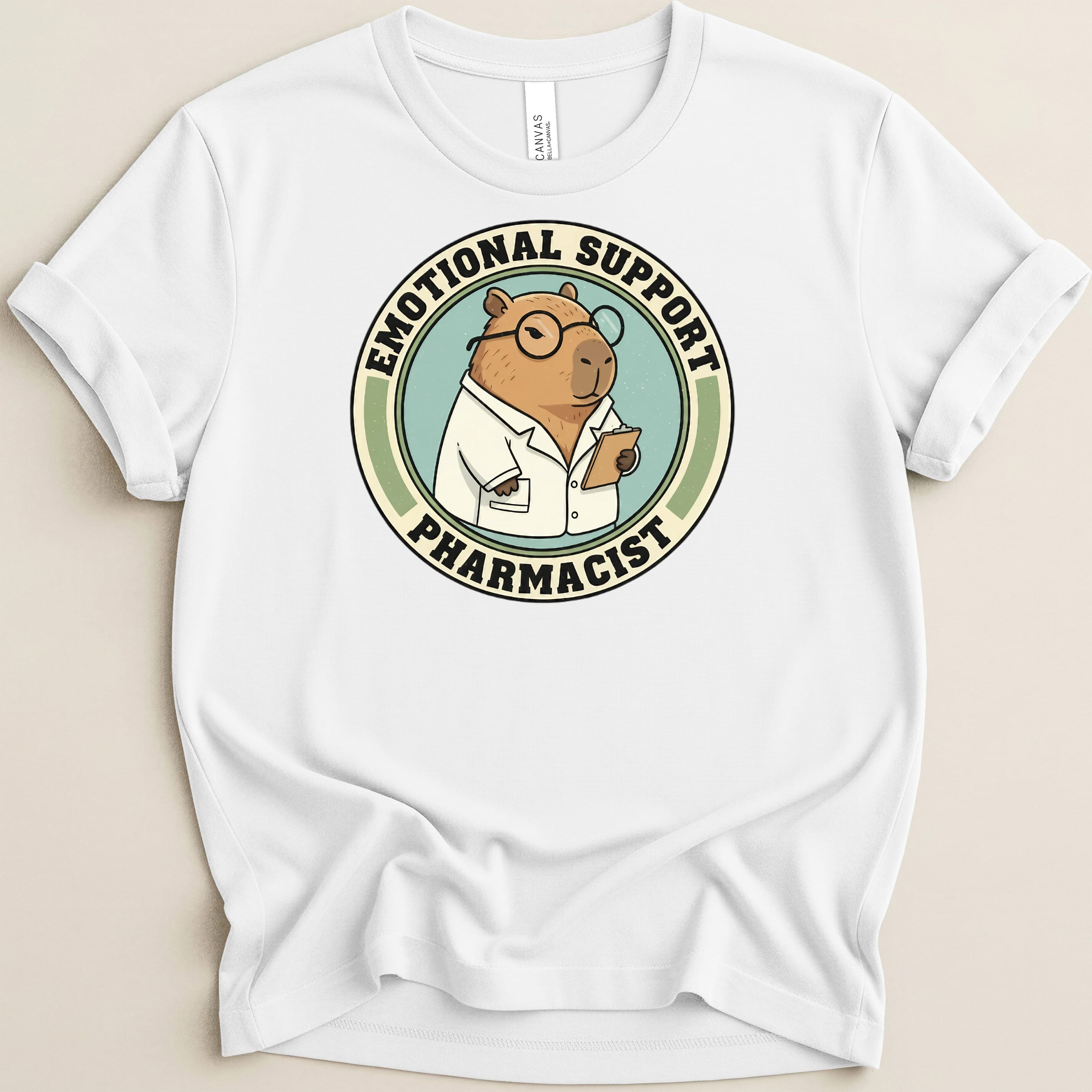 Capybara wearing glasses and lab coat, emotional support pharmacist graphic on white t-shirt.