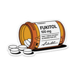 Orange pill bottle with "Fukitol 100 mg" label and spilled pills.