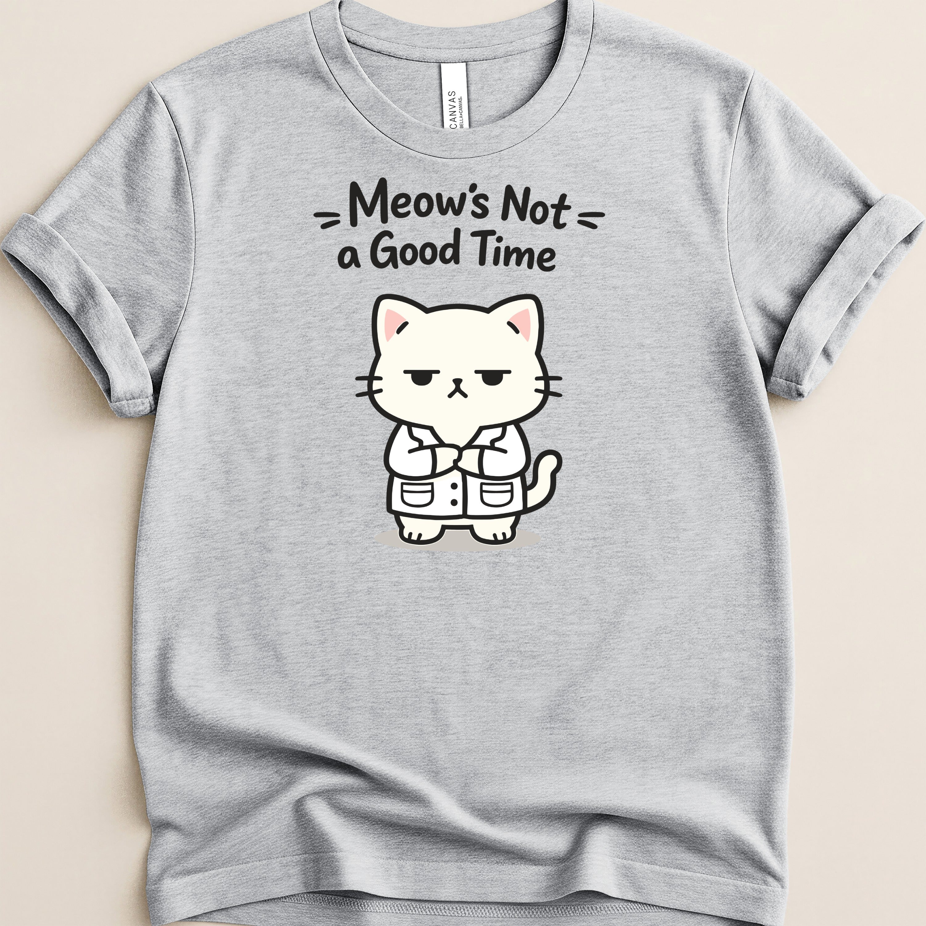 Gray t-shirt with a grumpy white cat wearing a lab coat and the text "Meow's Not a Good Time."