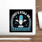 Cartoon capsule character with arms outstretched, text "THAT'S STILL ON BACKORDER".