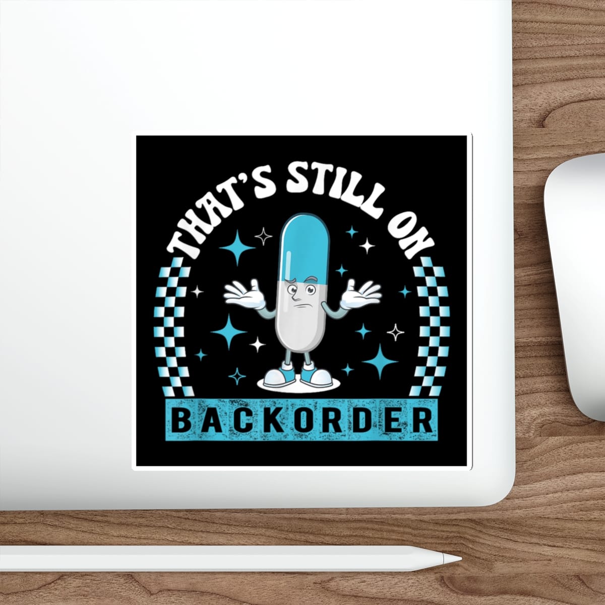 Cartoon capsule character with arms outstretched, text "THAT'S STILL ON BACKORDER".