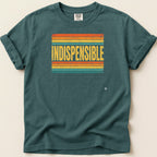 Teal t-shirt with distressed "INDISPENSABLE" text on retro stripes.