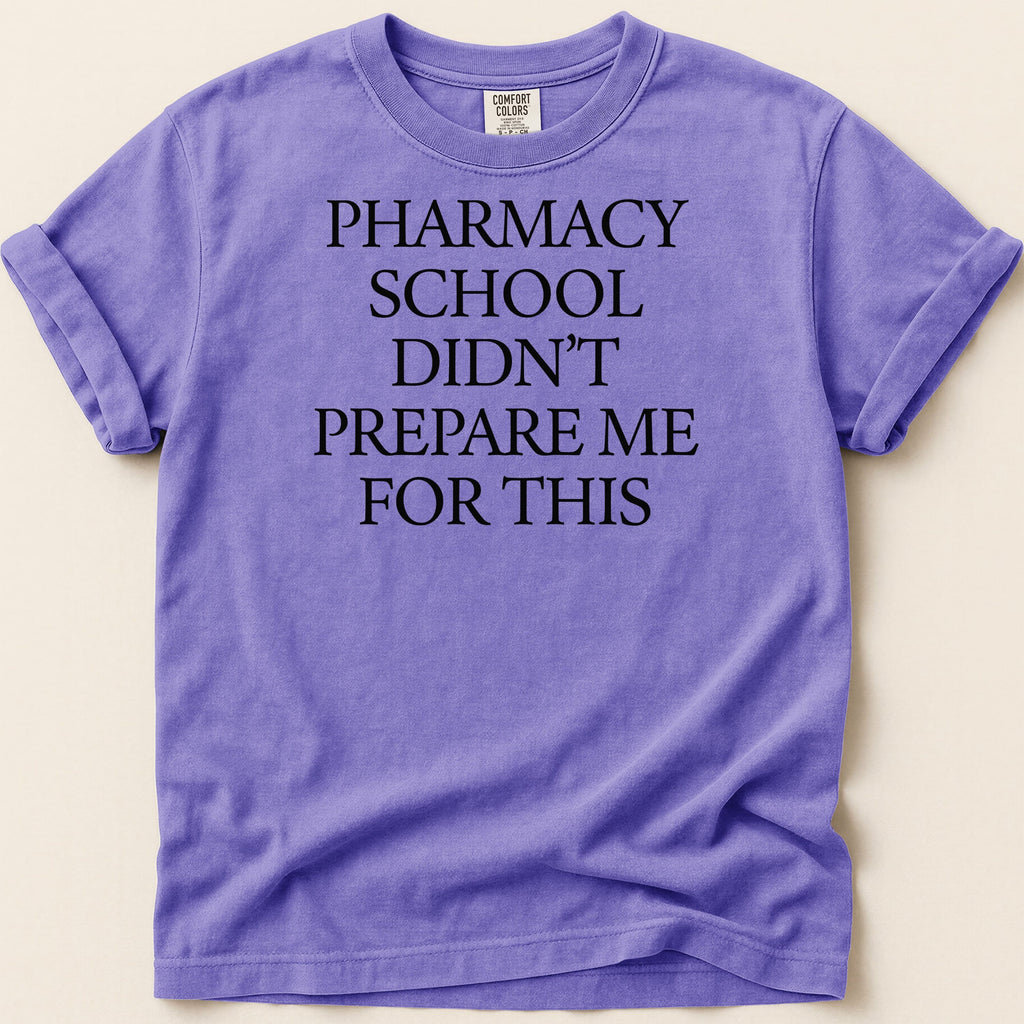 Purple t-shirt with "Pharmacy school didn't prepare me for this" text.