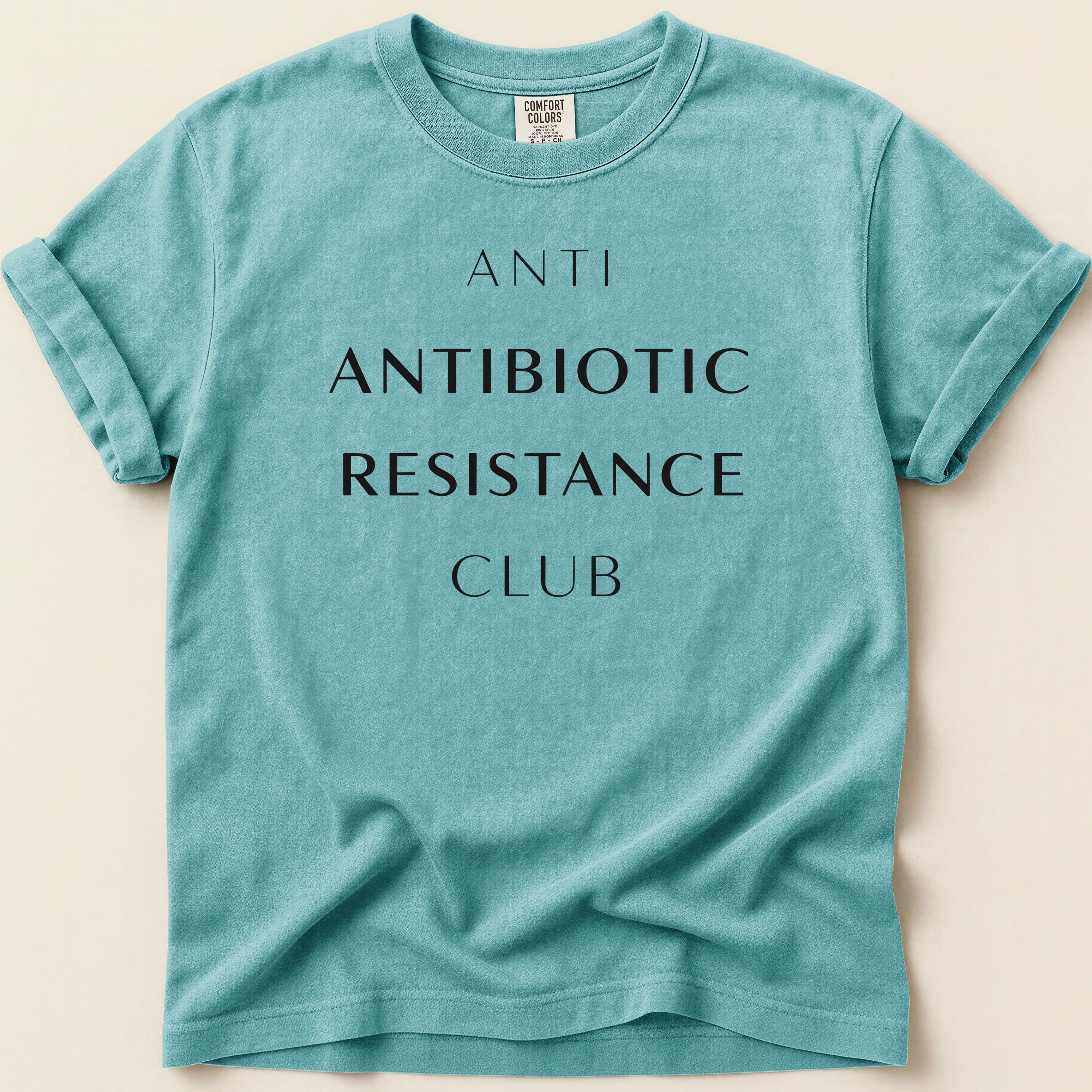 Teal t-shirt with "Anti Antibiotic Resistance Club" text.