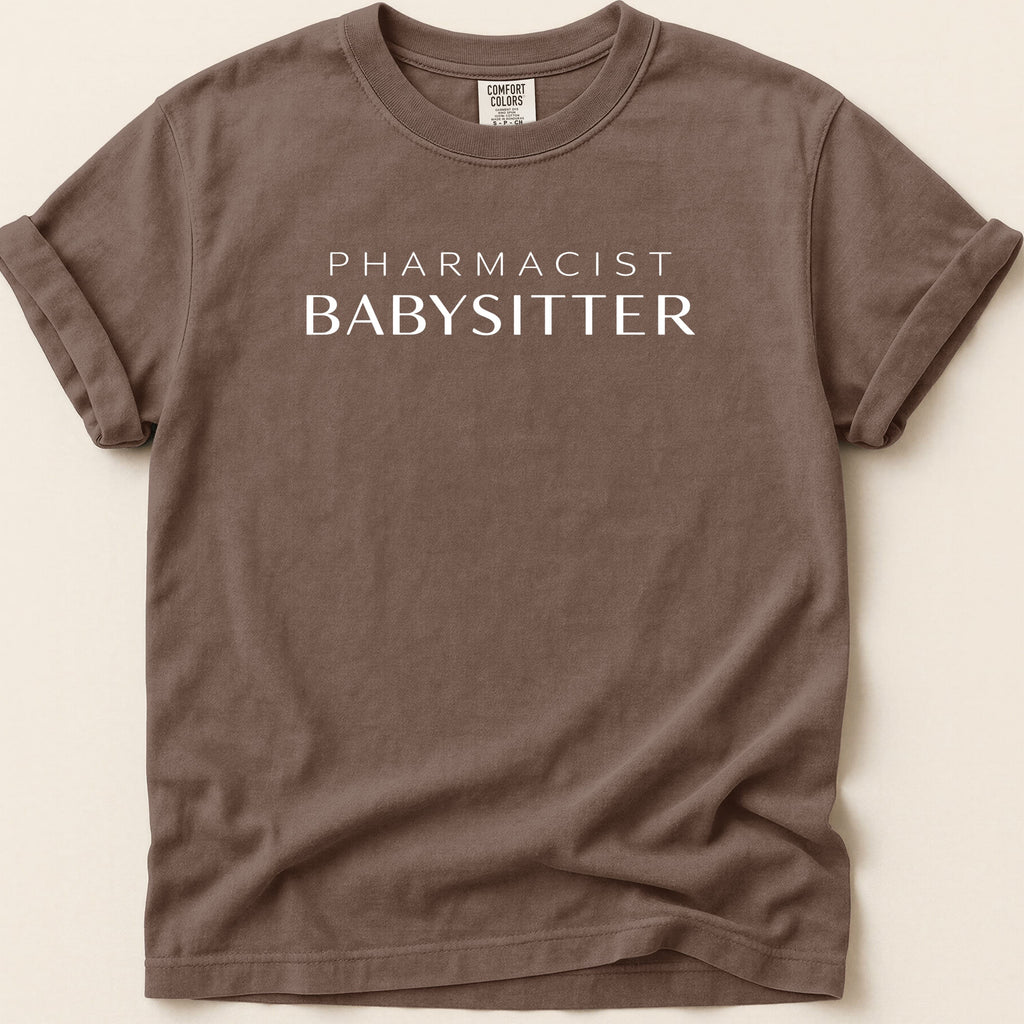 Brown t-shirt with "Pharmacist Babysitter" printed in white.