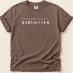 Brown t-shirt with "Pharmacist Babysitter" printed in white.